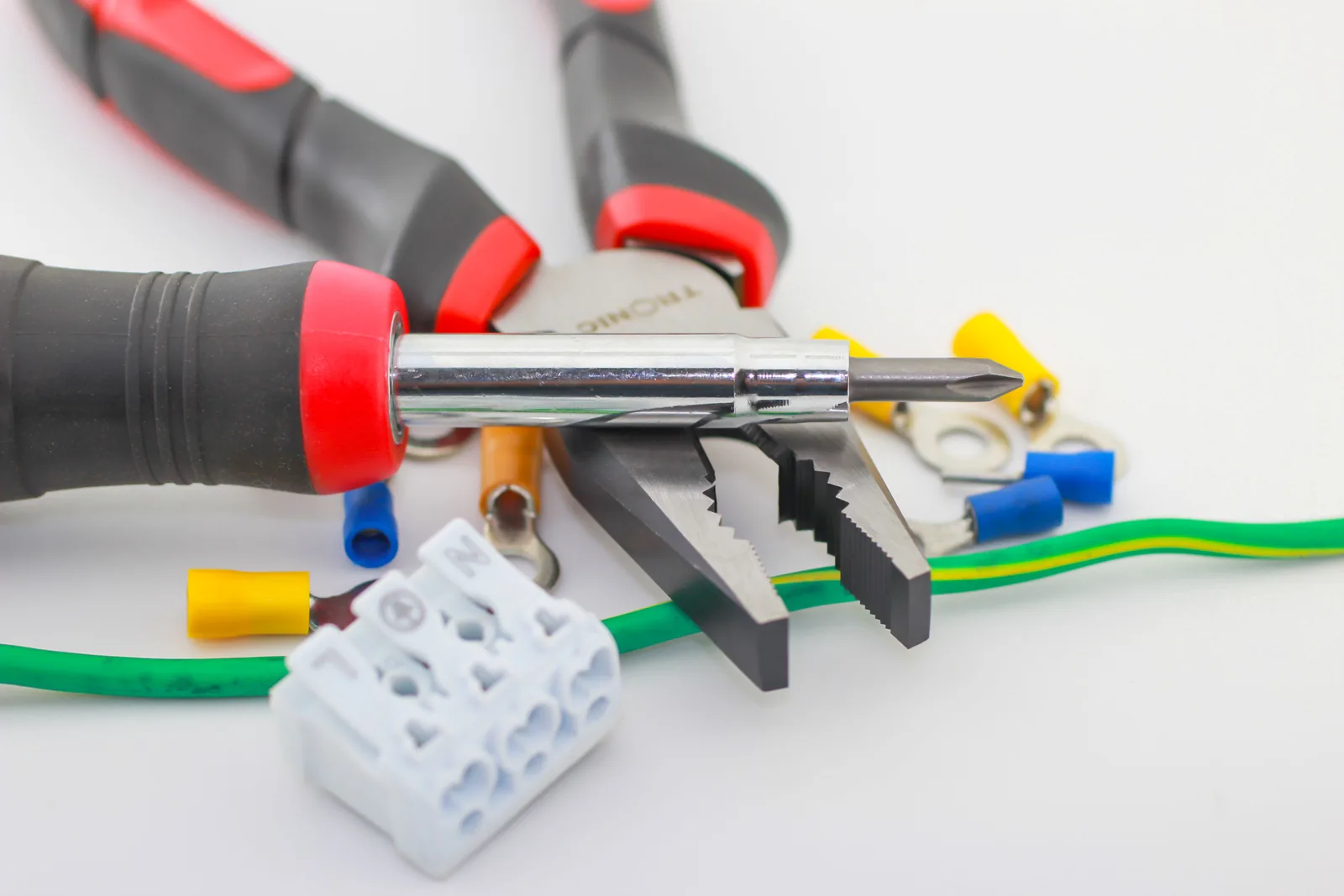 Pliers, a screwdriver, ferrules and a connector block, for electrician in Winnipeg