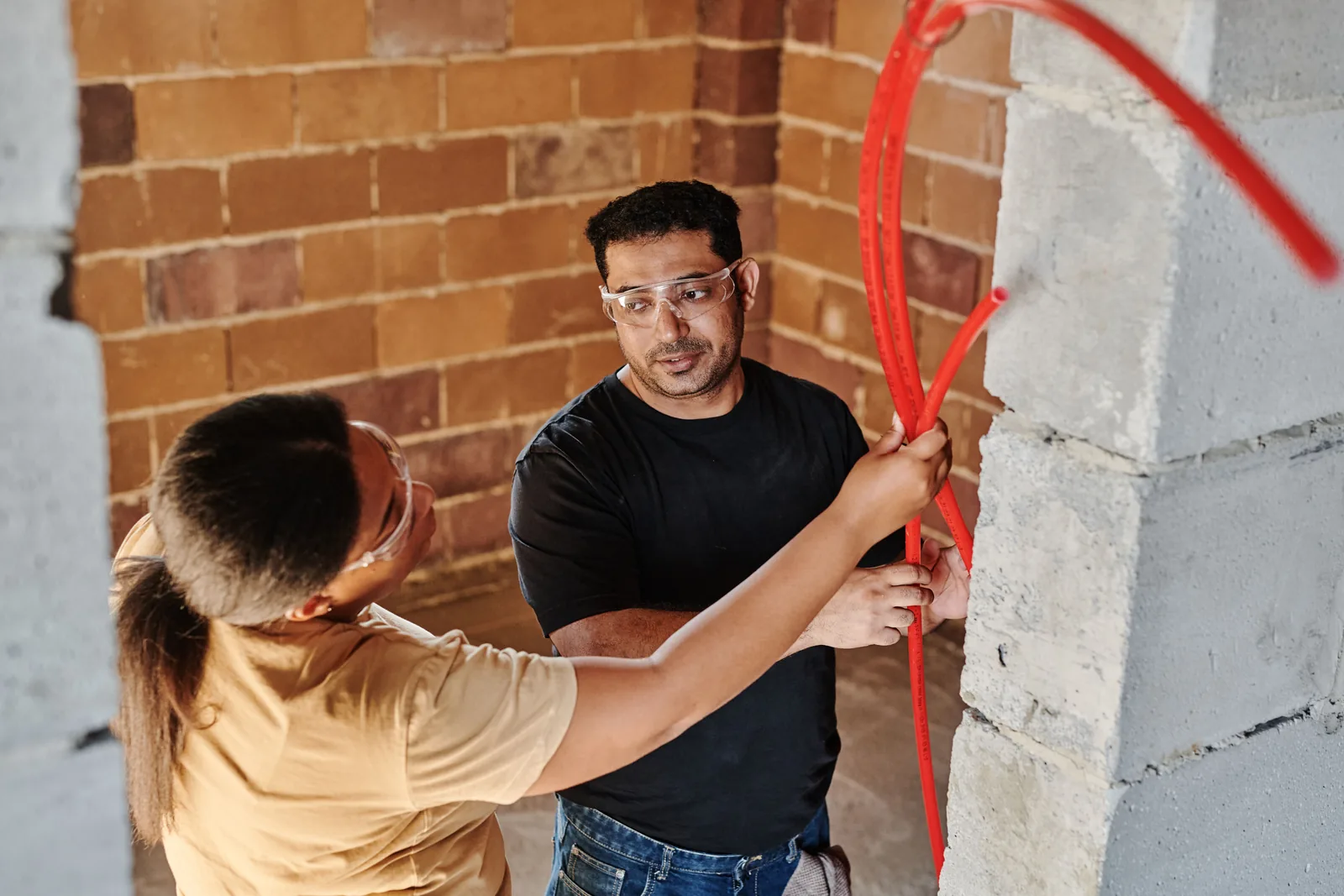 Running conduit across a block wall, for ev rebate in Winnipeg