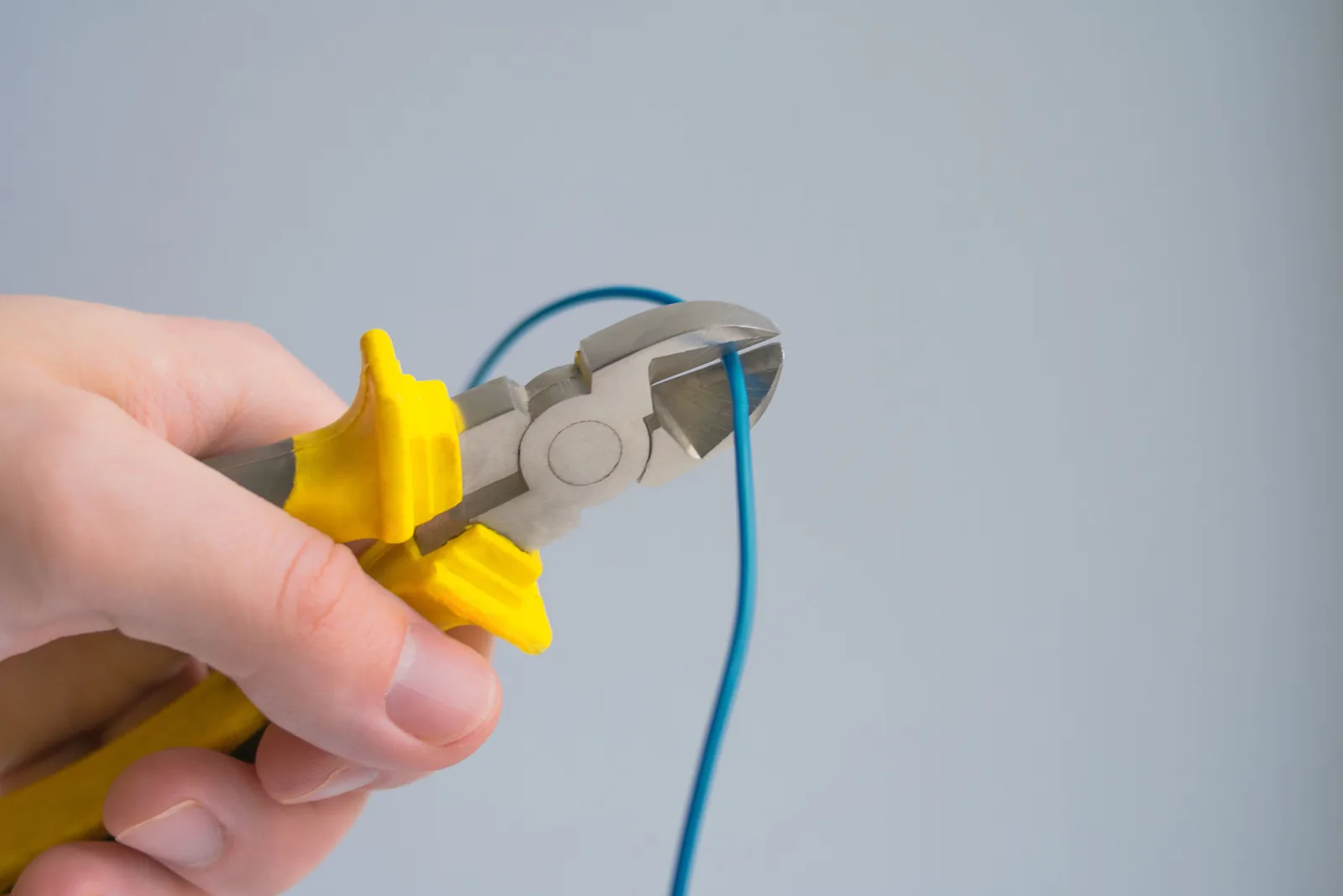 Cutting a conductor to length, for outlet installation in Winnipeg
